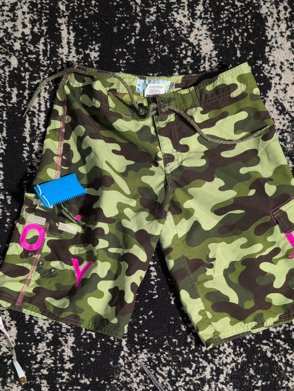 Camo Green Women’s Roxy Boardshorts with Pink Accents And Wax Tool
